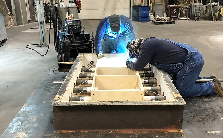 Workers Working On Damper Doors